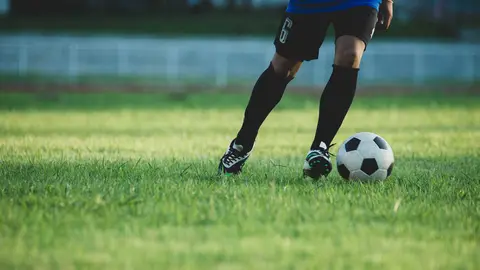 Soccer player action on the stadium