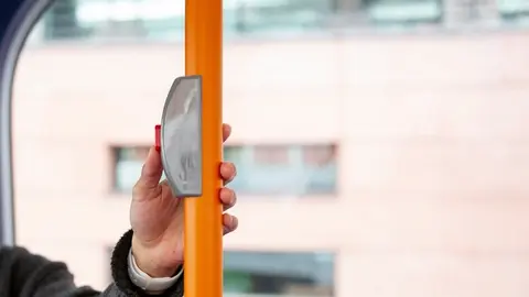 young-woman-stoping-bus-city (1)